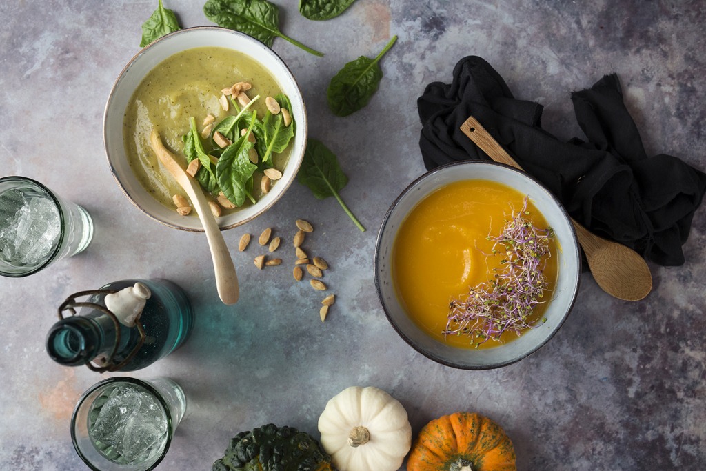 Two vegetables soups, one of them, it's a carrot soup