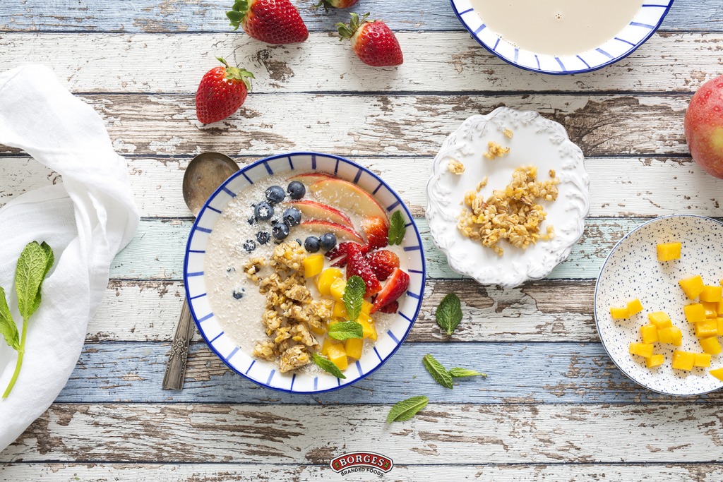 Healthy breakfast with key Ingredients such as walnut drink and some fruits like strawberries