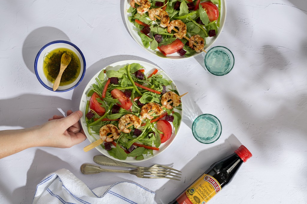 Shrimp skewers with salad
