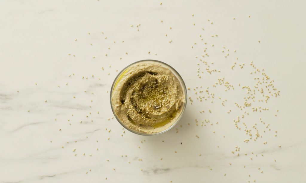 Lentil hummus recipe served in a glass