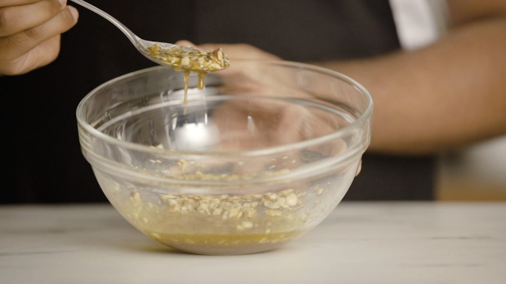 Nut vinaigrette in a glass bowl
