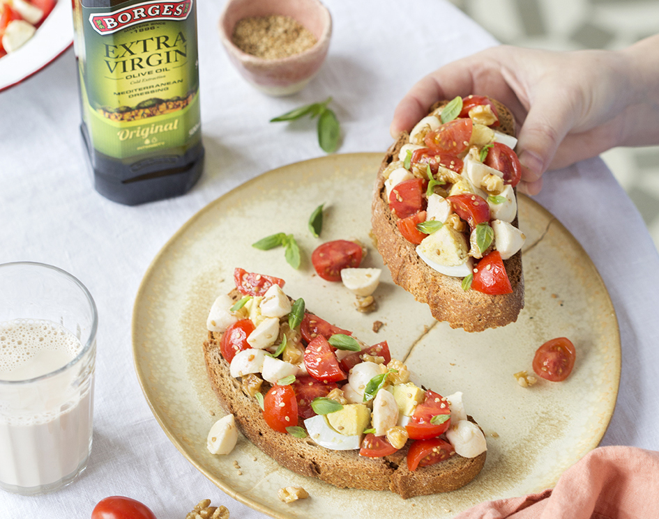 Breakfast toast with boiled egg, tomato and mozzarella
